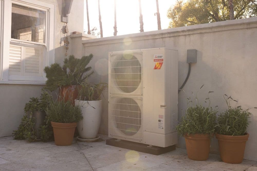 Home air conditioning system components during seasonal maintenance